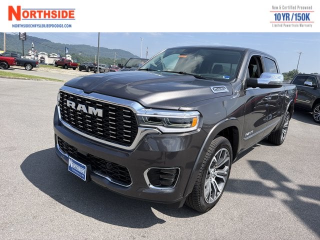 2026 RAM 1500 Tungsten in Granite Crystal Metallic Clear-Coat Exterior Paint — front three-quarter view