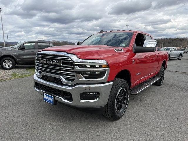 2026 RAM 2500 Laramie in Flame Red Clear-Coat Exterior Paint — front three-quarter view